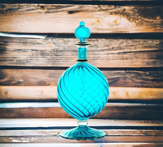 Hand-Blown Blue Glass Perfume Bottle with Swirled Design โ Decorative Art Glass Piece | Les Trois Pyramides