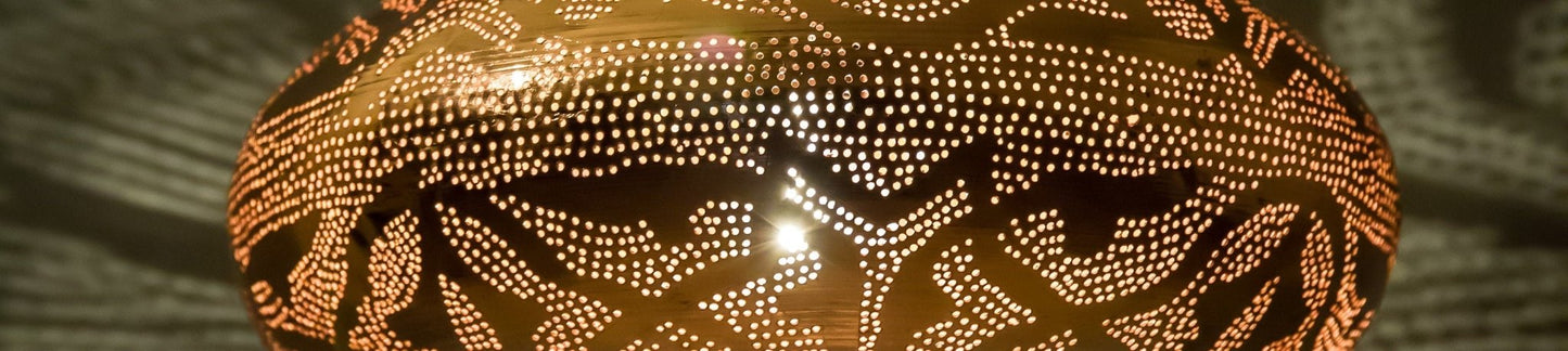 Handcrafted Moroccan pendant light close up | Les Trois Pyramides