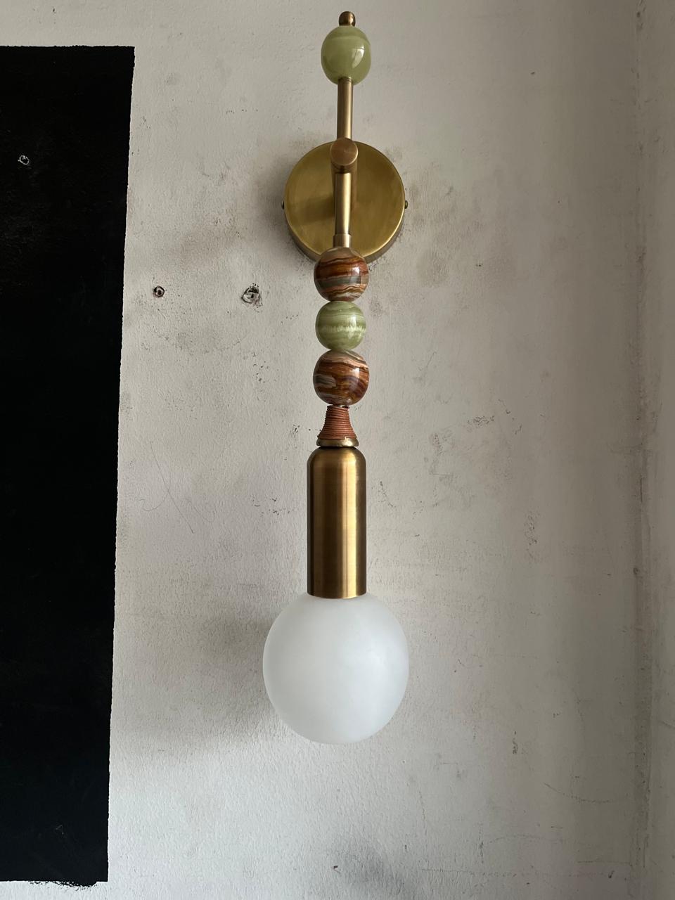 Luxury Brass Wall Sconce with Frosted Globe & Stone Accents | Les Trois Pyramides
