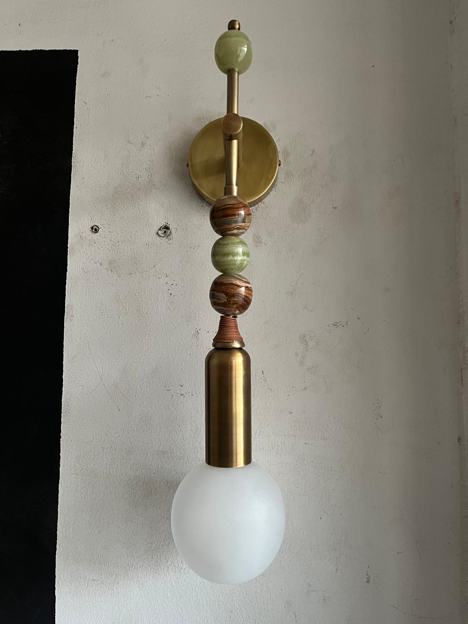 Luxury Brass Wall Sconce with Frosted Globe & Stone Accents | Les Trois Pyramides
