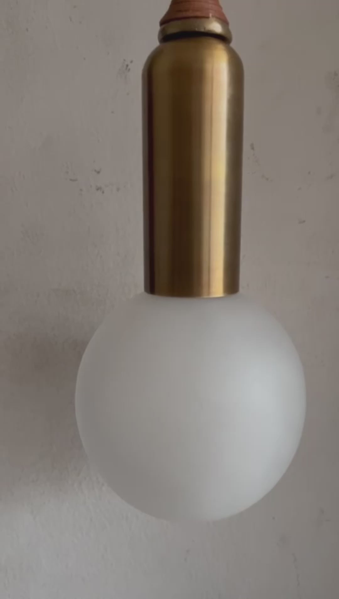 Luxury Brass Wall Sconce with Frosted Globe & Stone Accents | Les Trois Pyramides