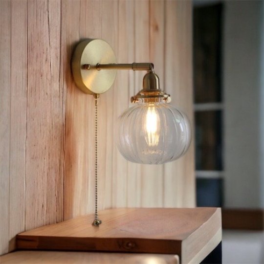 Vintage Brass Wall Sconce with Handblown Ribbed Glass Shade - Elegant Pull Chain Light Fixture for Bedroom or Living Room | Les Trois Pyramides