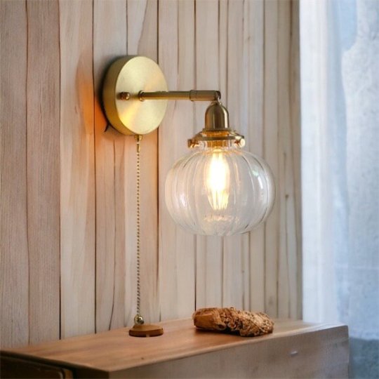 Vintage Brass Wall Sconce with Handblown Ribbed Glass Shade - Elegant Pull Chain Light Fixture for Bedroom or Living Room | Les Trois Pyramides