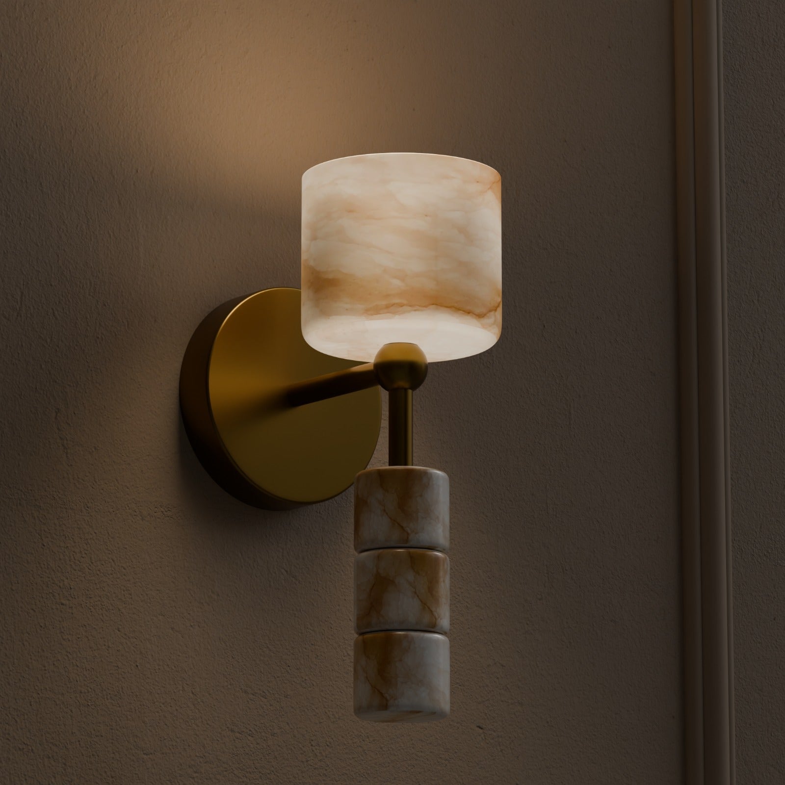 Alabaster wall light with brass finish emitting soft warm glow in dim interior setting
