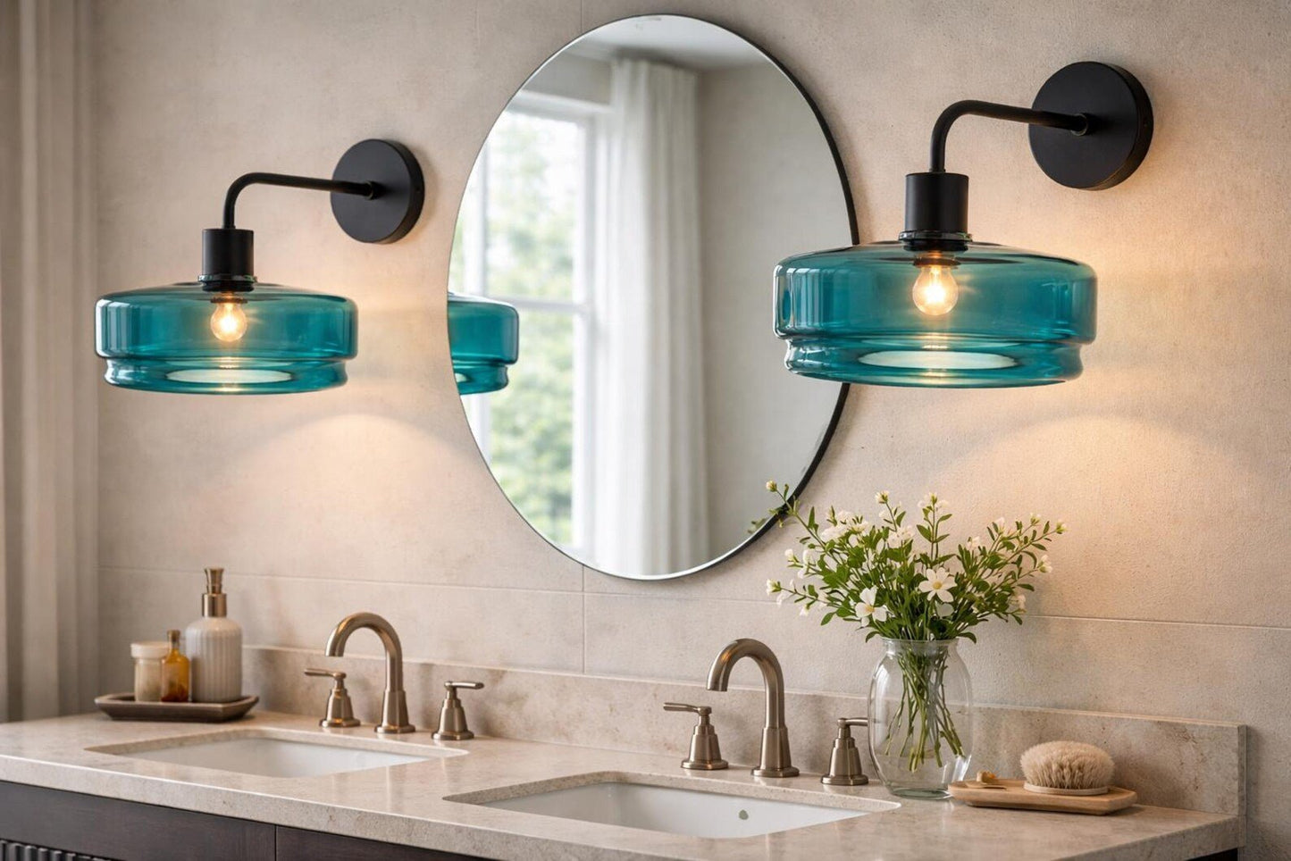 Bathroom vanity with round mirror, blue wall lights, and decorative elements.