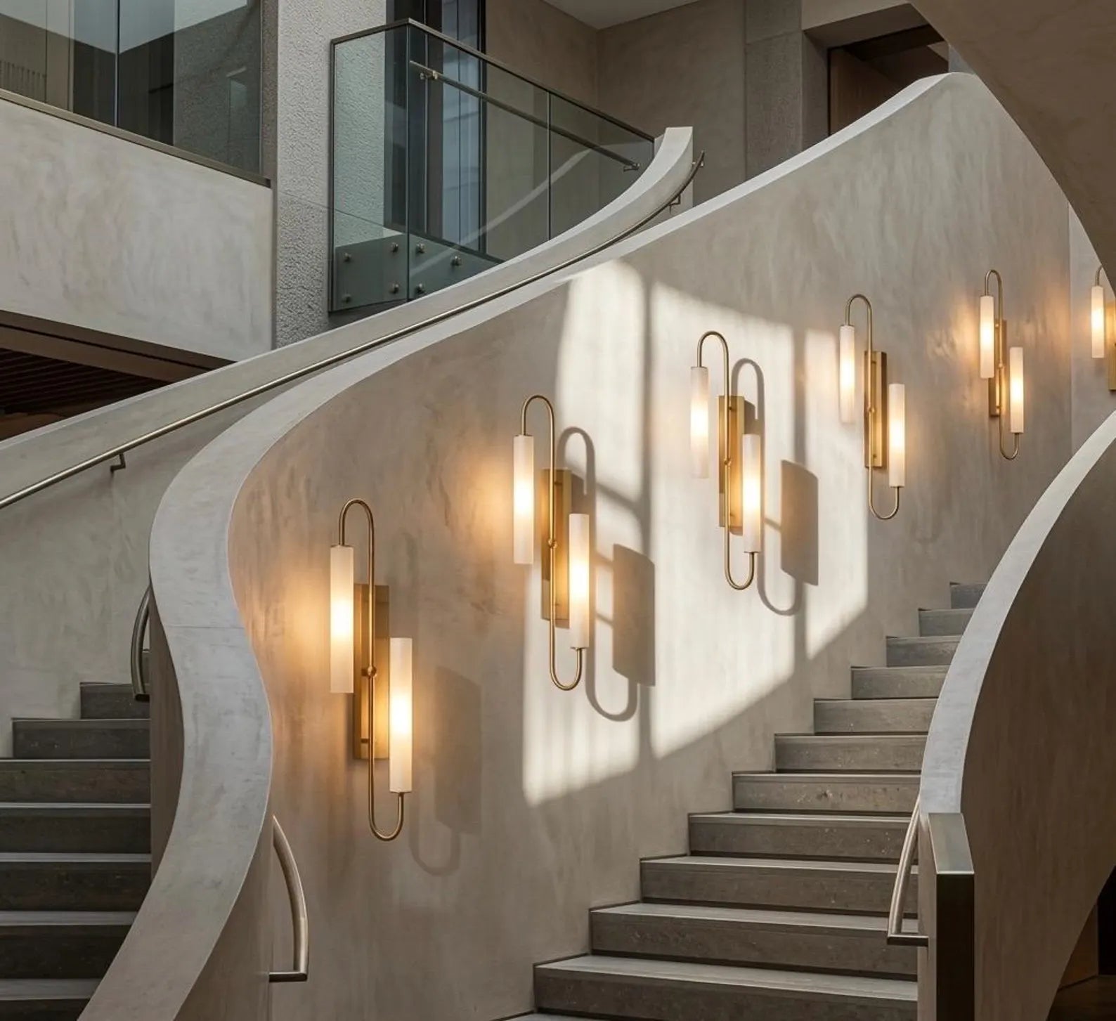 Modern staircase with wall-mounted lights in a stylish interior setting