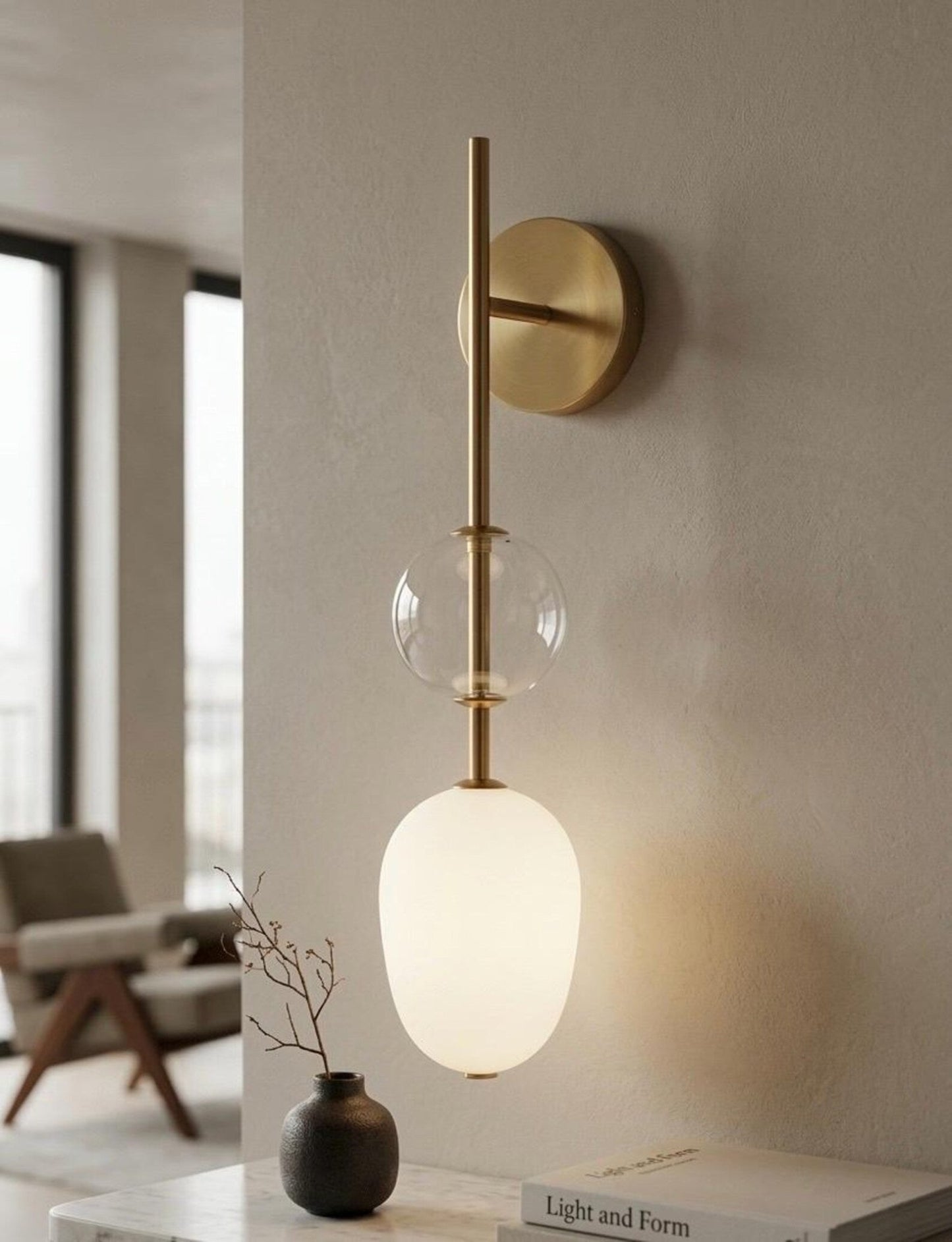 Modern wall sconce with glass shades in a home setting