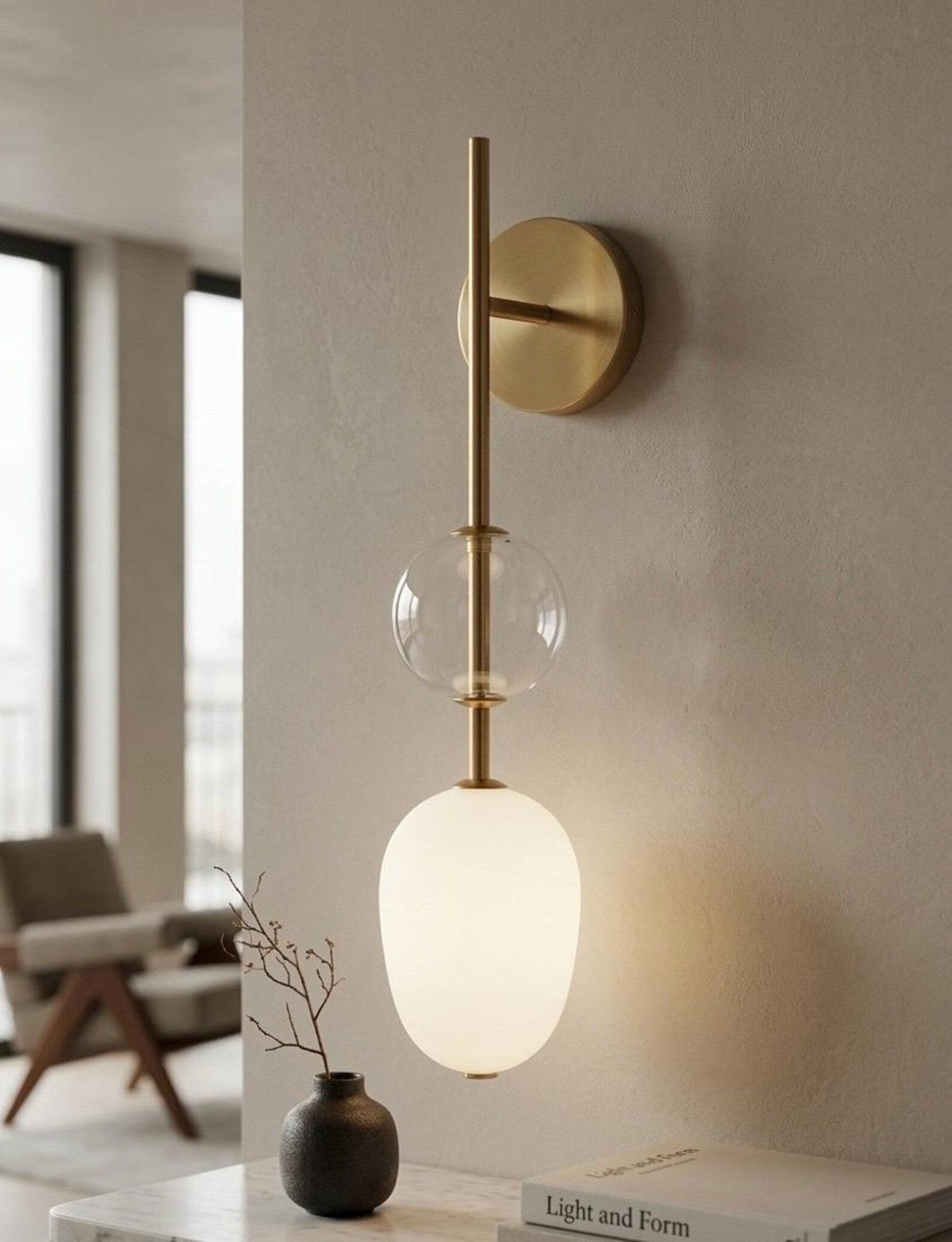 Modern wall sconce with glass shades in a home setting