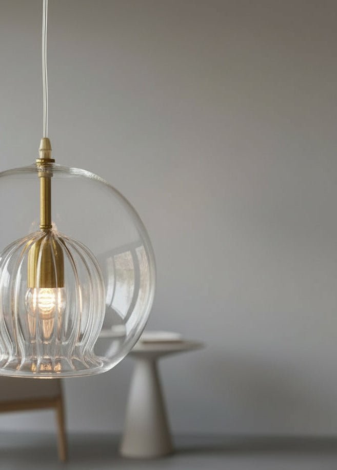 Clear Ribbed Glass Pendant Light – Hand-Blown Globe with Brass Accents