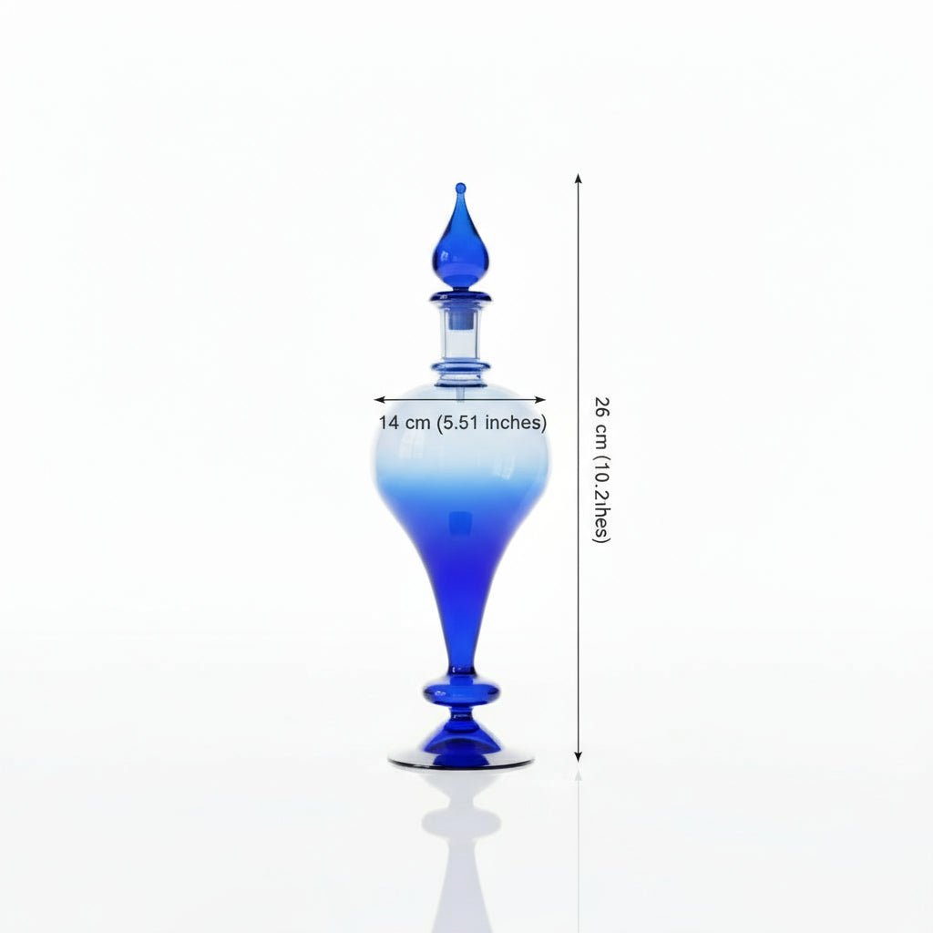 Blue and white glass bottle with a narrow neck on a white background