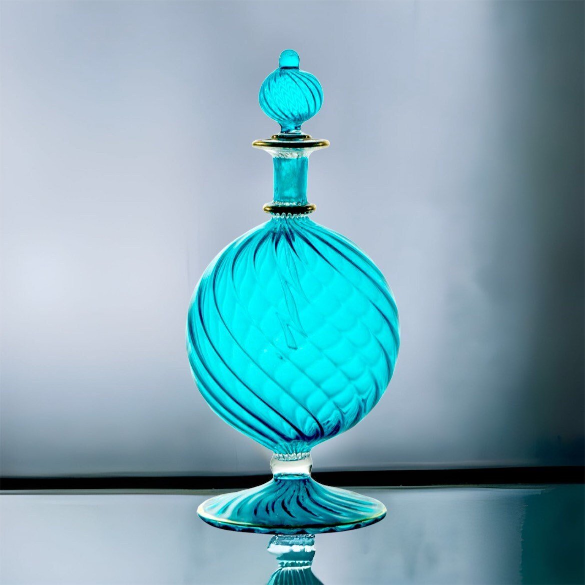 Hand-Blown Blue Glass Perfume Bottle with Swirled Design – Decorative Art Glass Piece | Les Trois Pyramides 