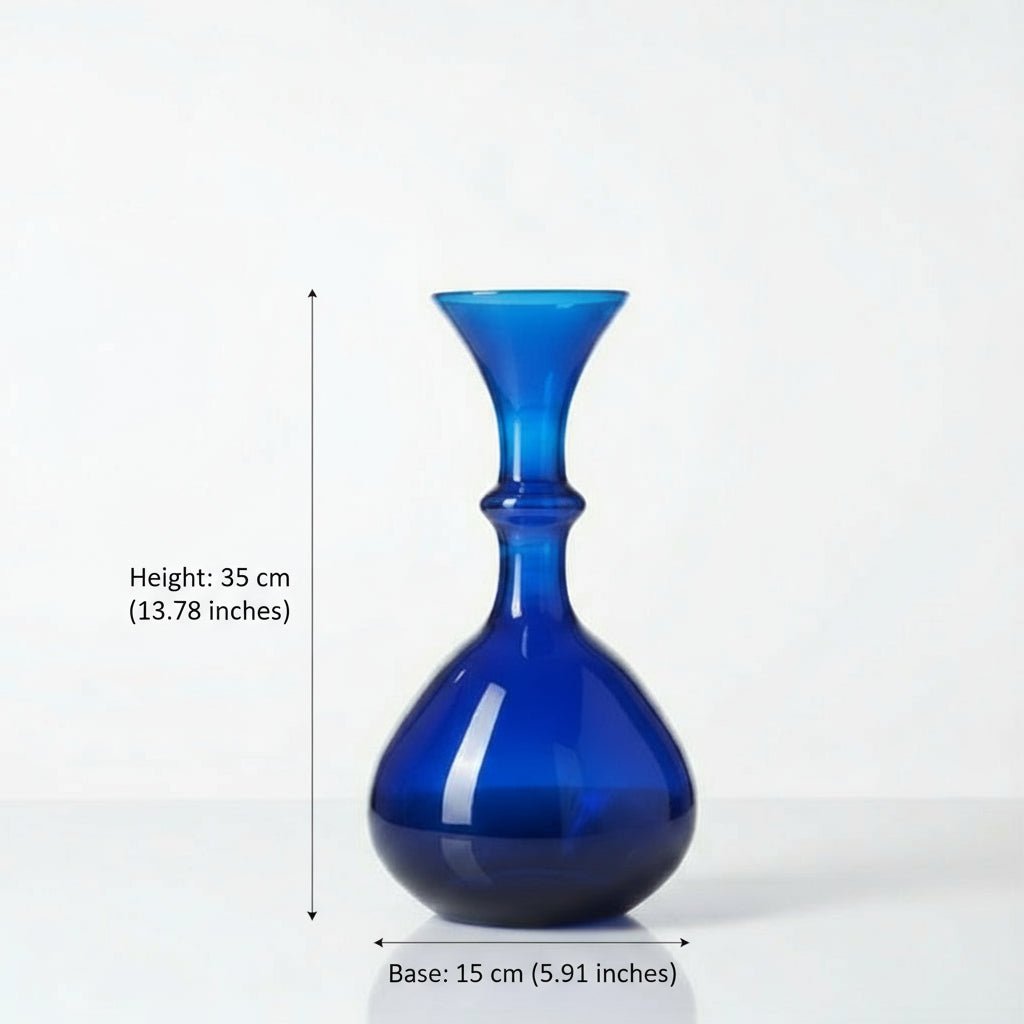 Blue glass vase on a white background