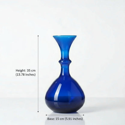 Blue glass vase on a white background