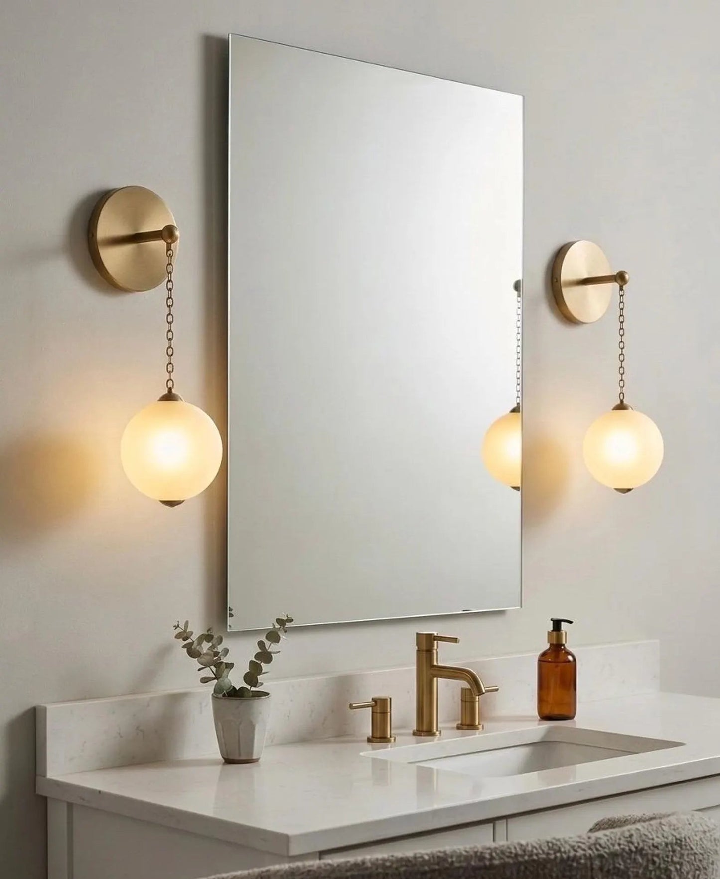 Bathroom vanity with mirror, lights, and sink.