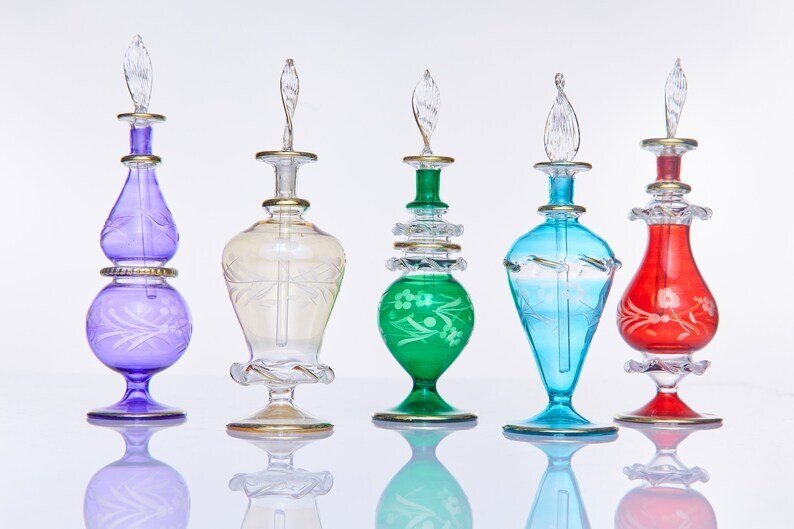 set of four Hand-Blown Glass Bottles for Perfume & Essential Oils with Gold Detailing | Les Trois Pyramides