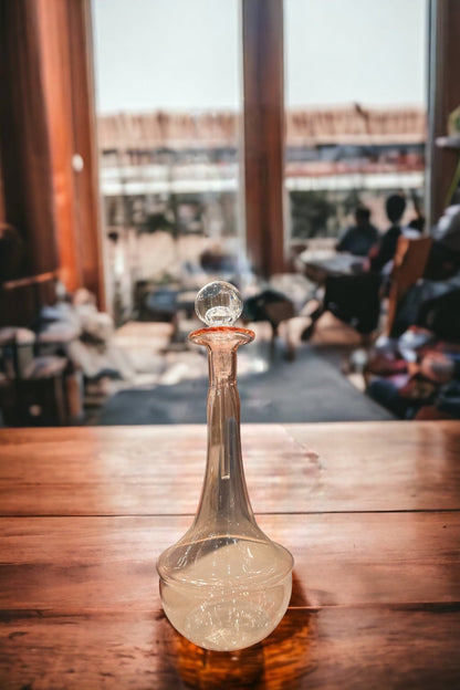 Hand-Blown Pink Glass Decanter with Globe Stopper – Elegant Vintage-Style Decorative Bottle | Les Trois Pyramides