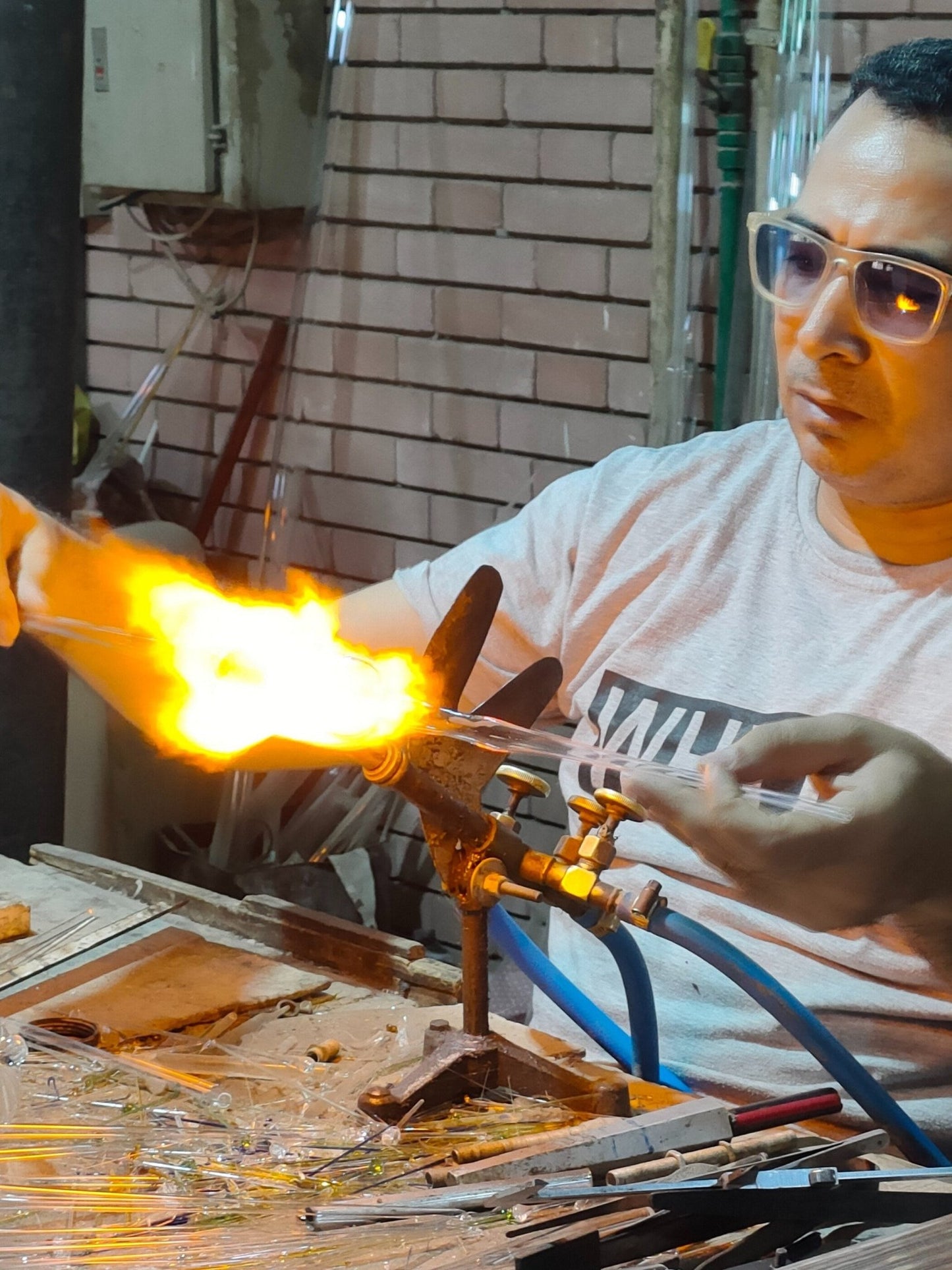 the making of Hand-Blown Red Glass Christmas Ornament – Engraved Floral Design for Elegant Holiday Decor | Les Trois Pyramides