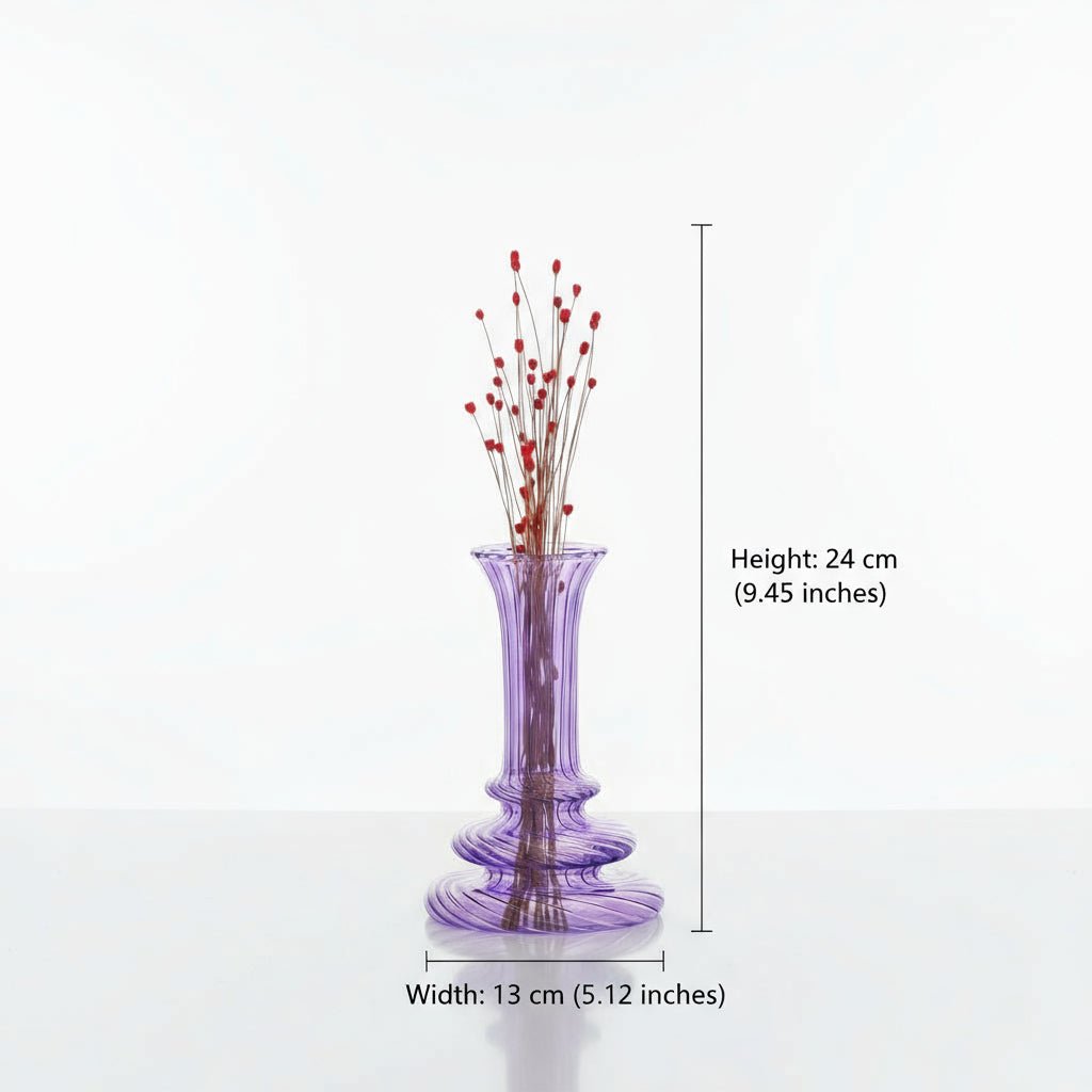Purple glass vase with red decorative elements on a white background