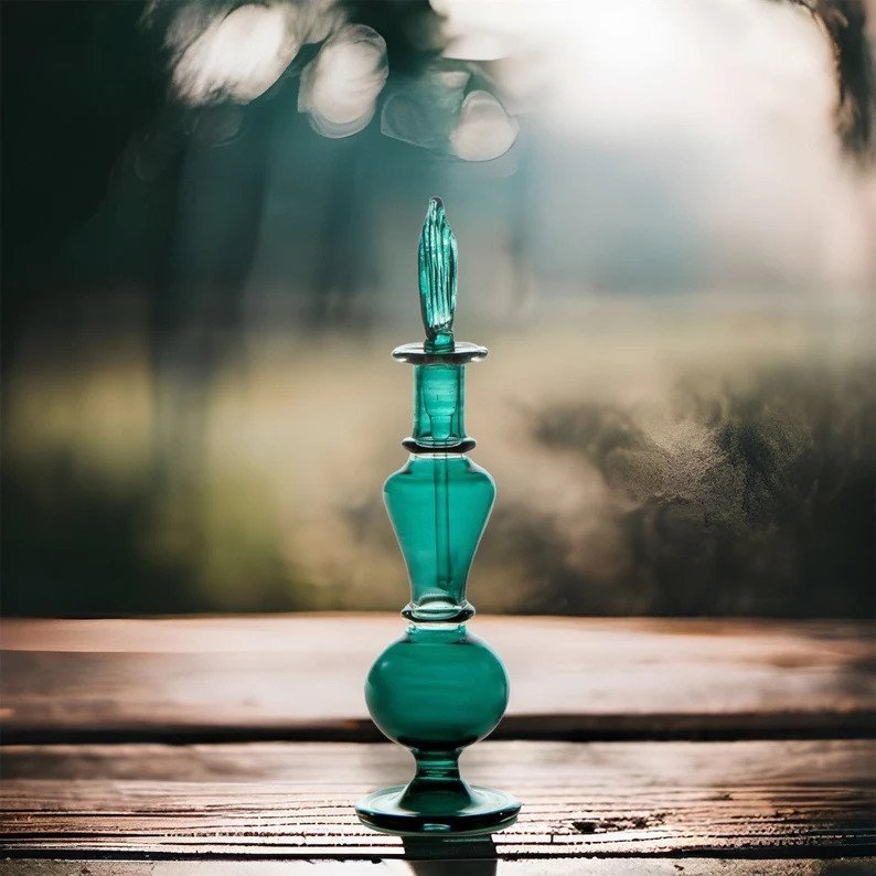 Handcrafted Emerald Green Glass Perfume Bottle with Decorative Stopper | Les Trois Pyramides