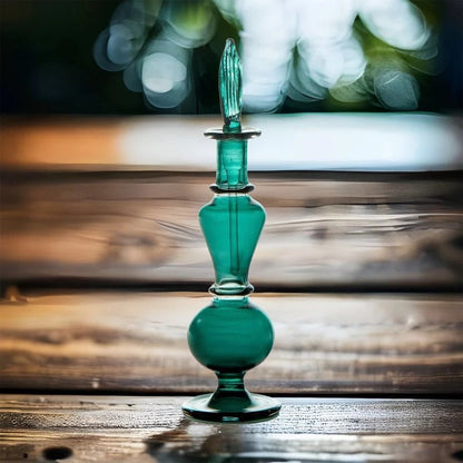 Handcrafted Emerald Green Glass Perfume Bottle with Decorative Stopper | Les Trois Pyramides