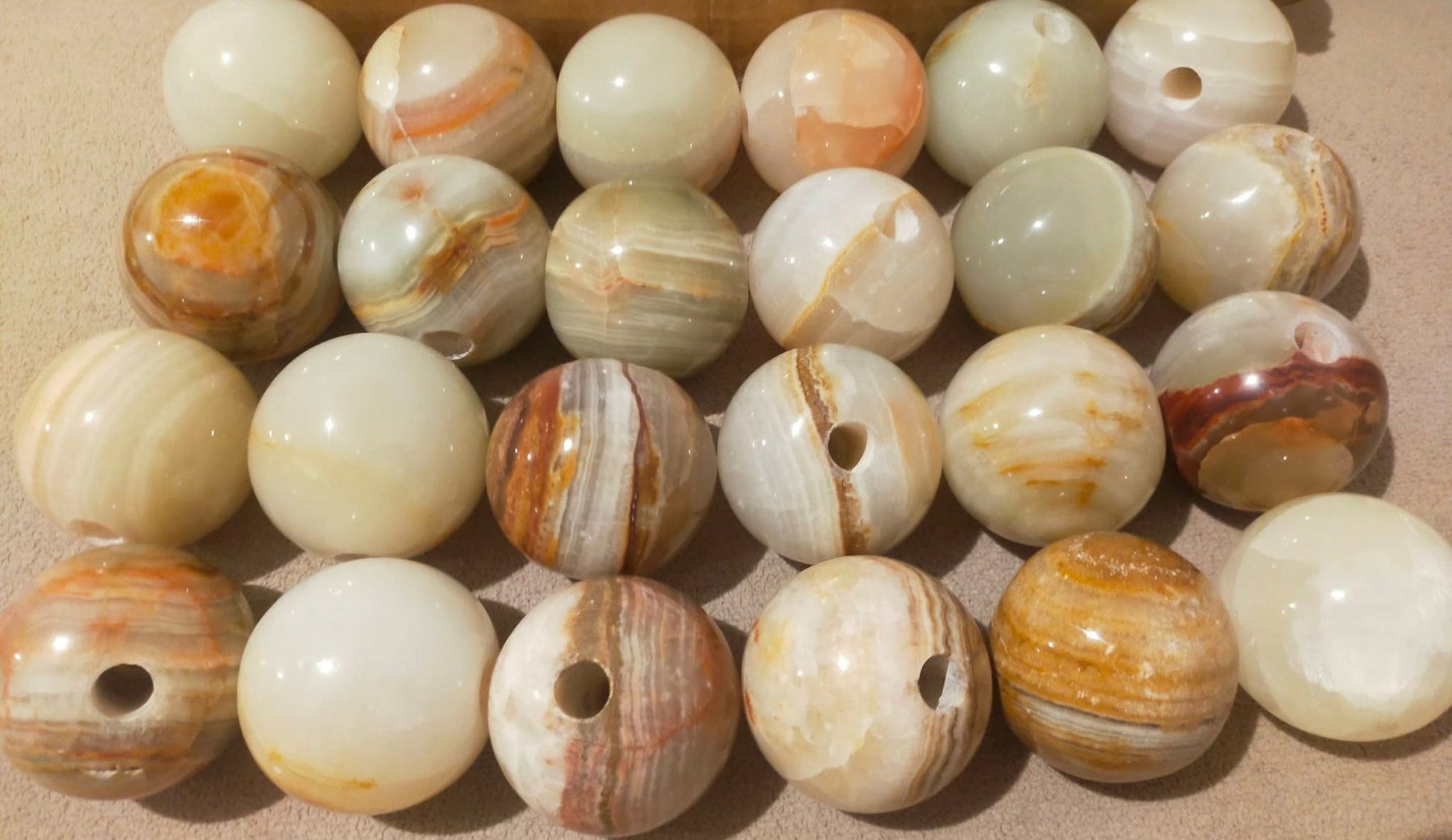 Natural onyx stone variations used for handmade wall sconces