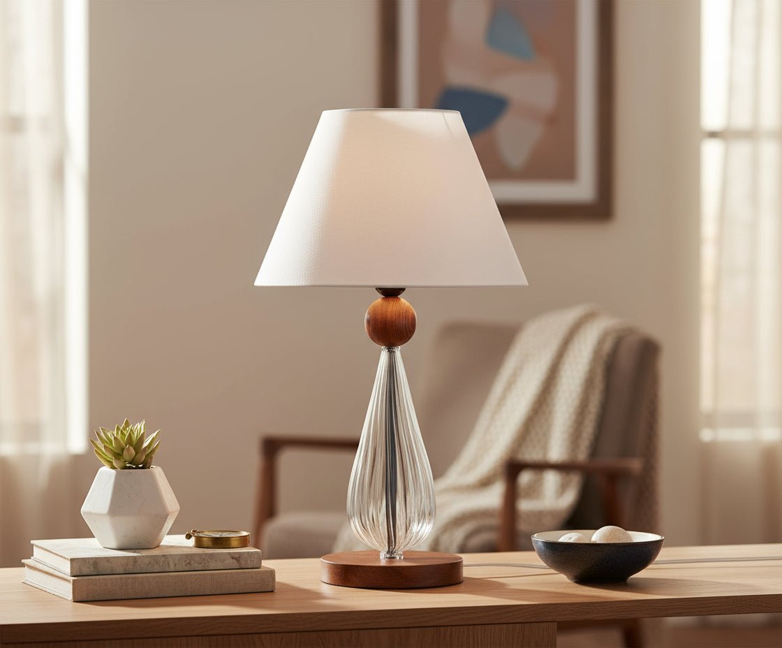 Table lamp with a wooden base and white shade on a light gray background
