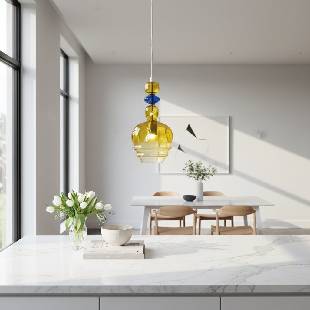Yellow pendant light with blue accent on a white background
