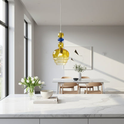 Yellow pendant light with blue accent on a white background