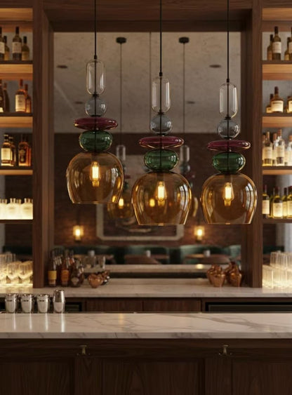 Restaurant bar pendant Lights with light on | Les Trois Pyramides