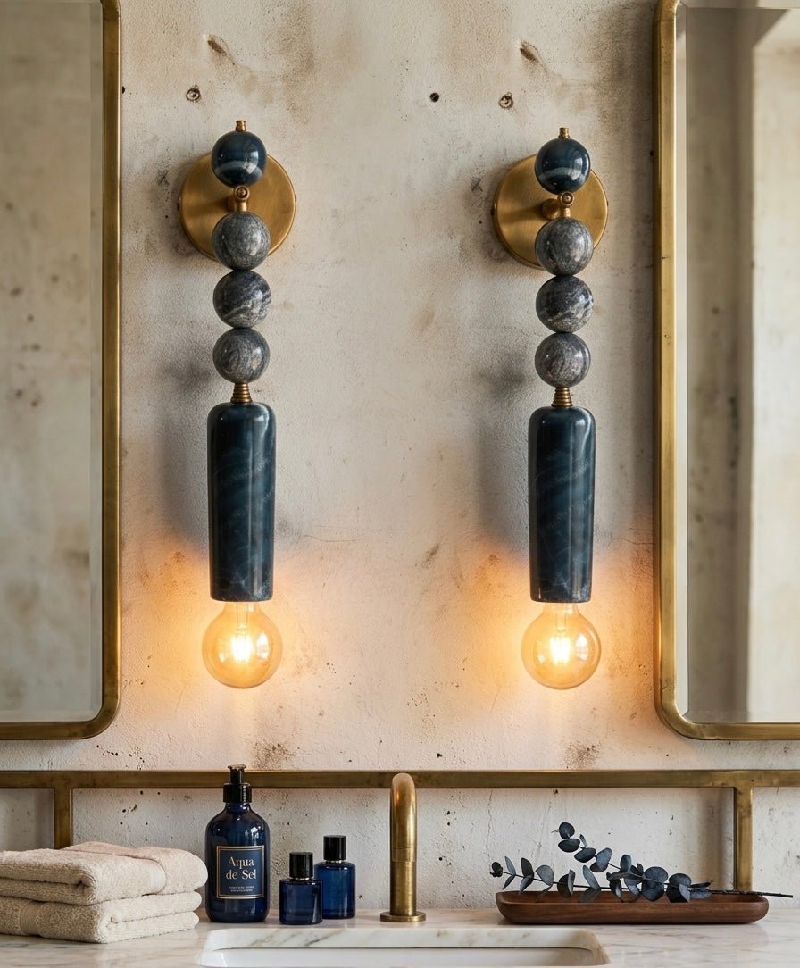 Pair of wall sconces with Natural Marble stones on a neutral background - Les Trois Pyramides