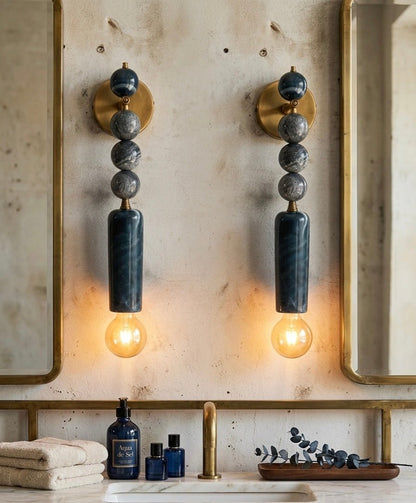 Pair of wall sconces with Natural Marble stones on a neutral background - Les Trois Pyramides