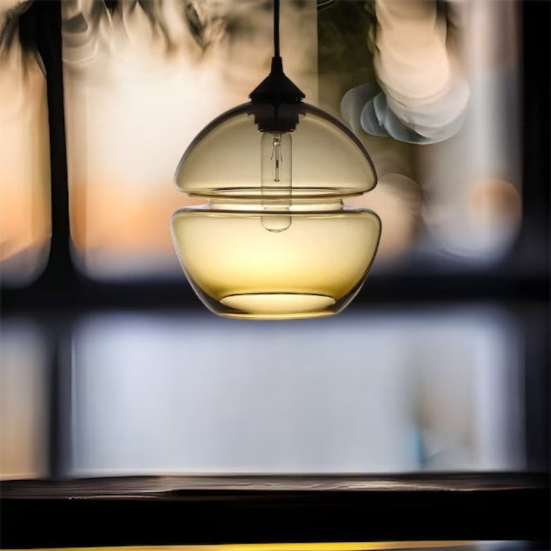 Handcrafted Glass Amber Pendant Light double globe design | Les Trois Pyramides.