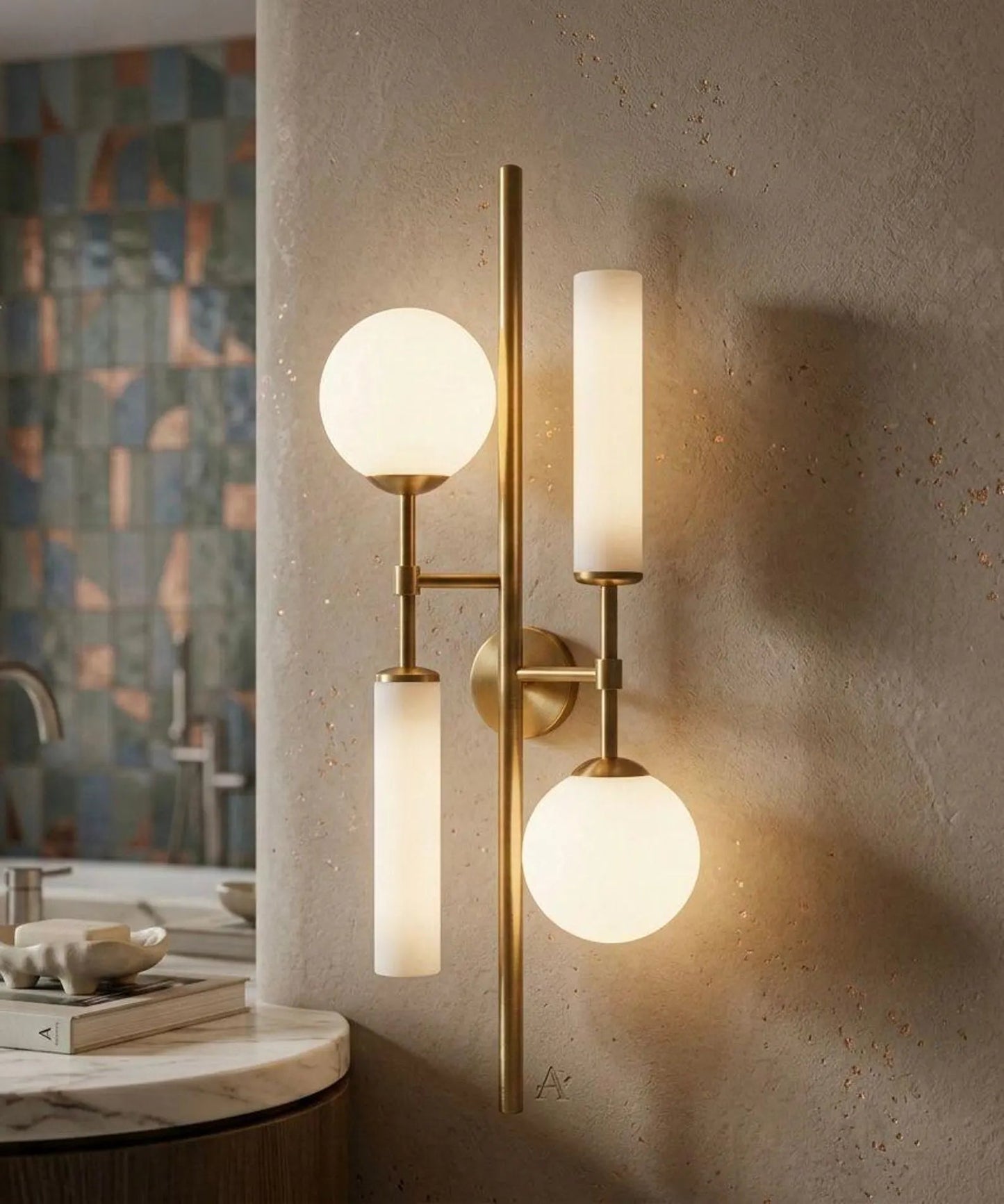 Modern wall sconce with glass globe lights on a textured wall.