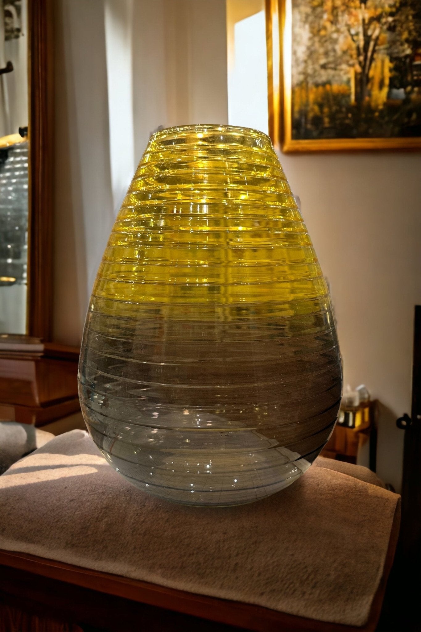 Modern Glass vase with Grading yellow and black colors in living room | Les Trois Pyramides