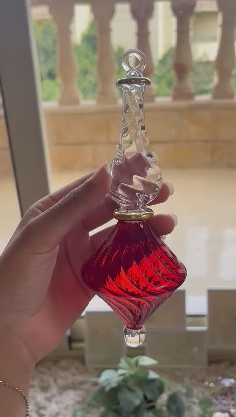 Red Ribbed Glass Ornament with 14 K Gold Lining - Les Trois Pyramides