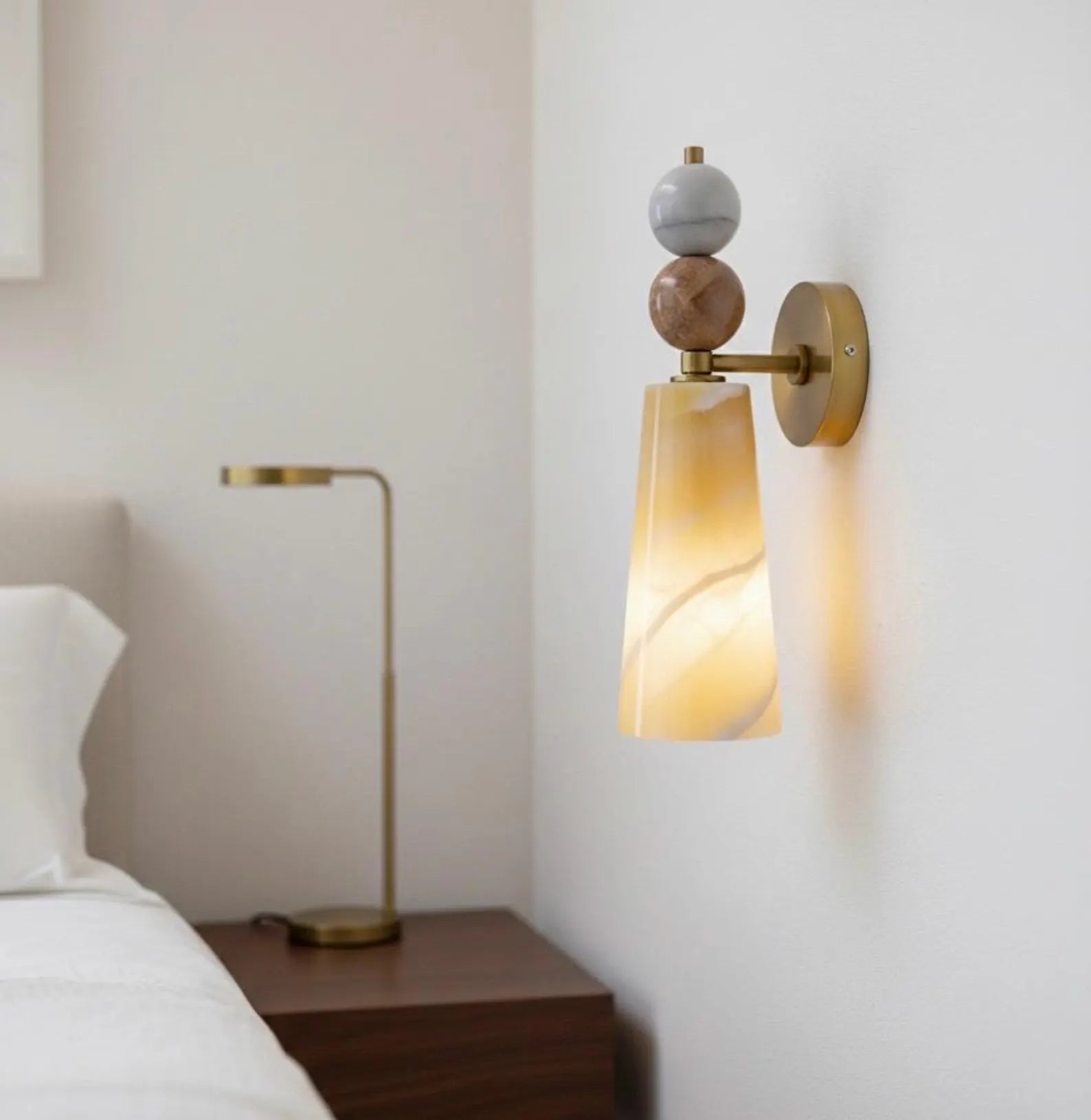 Wall sconce with a warm light .