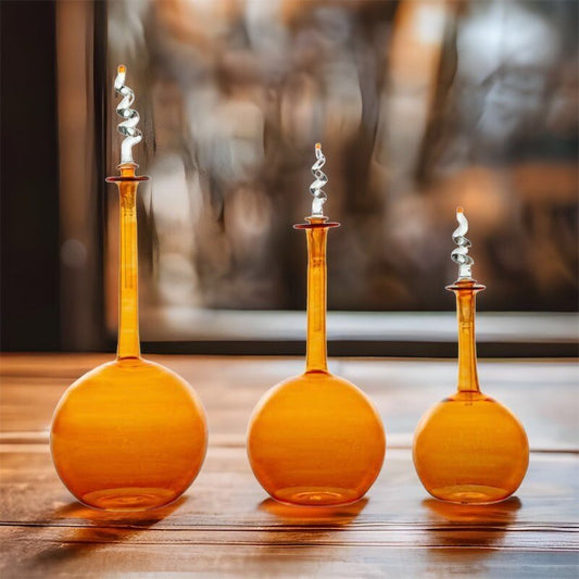 Set of Amber Handcrafted Glass Bottles with Decorative Spiral Stoppers - Les Trois Pyramides