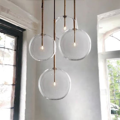 Set of four blown glass pendant lights with copper rods for Living Room