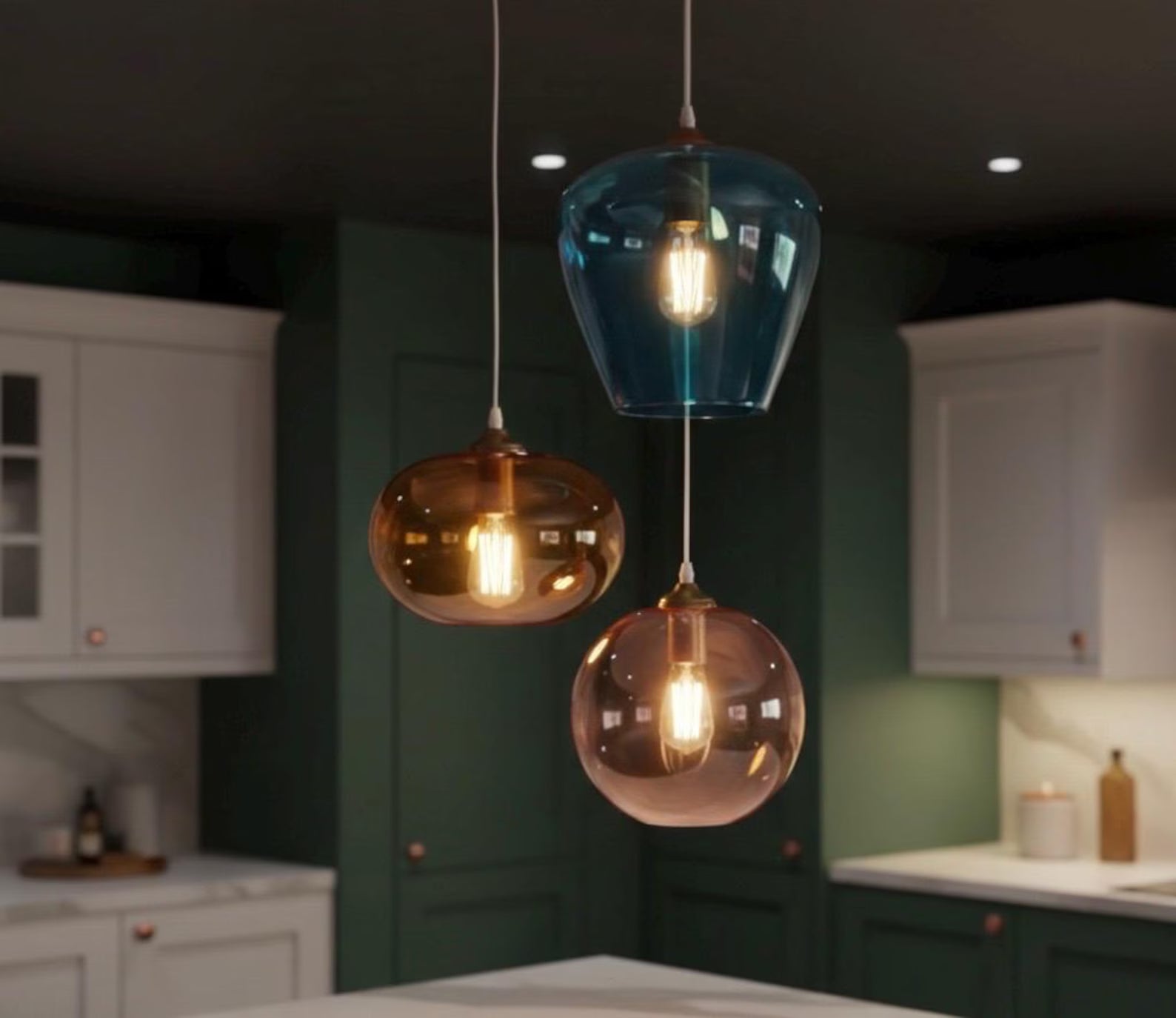 Set of three blown glass light pendants for kitchen decor | Les Trois Pyramides.