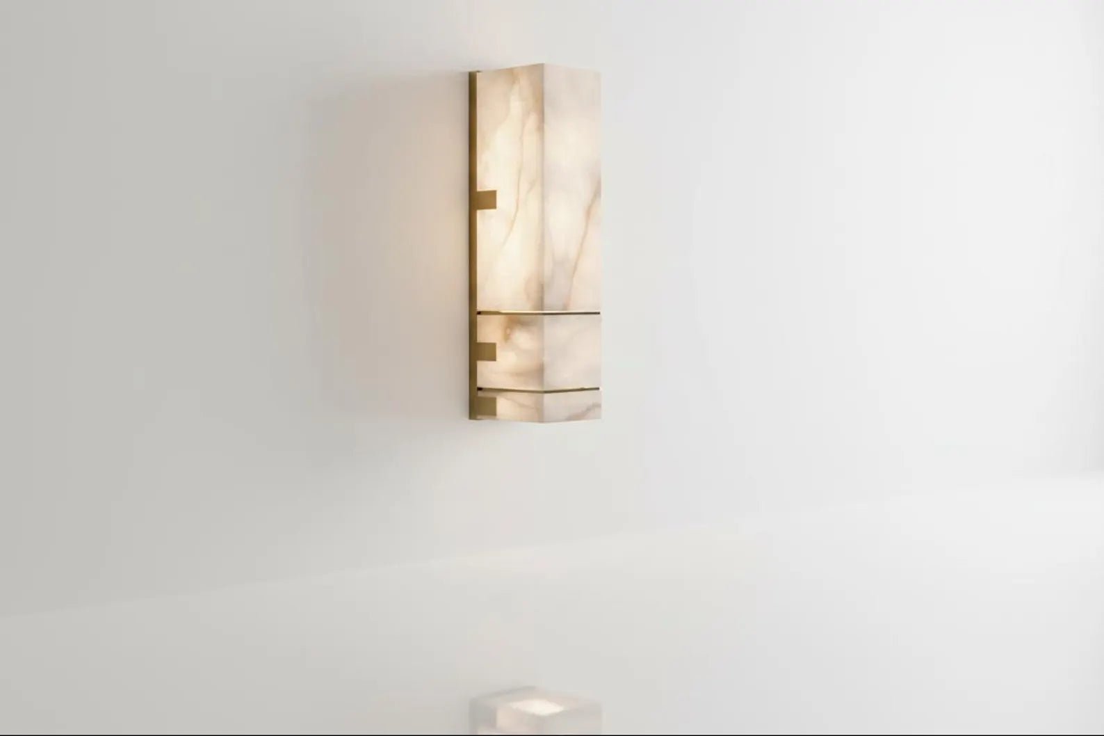Modern wall sconce on a white wall