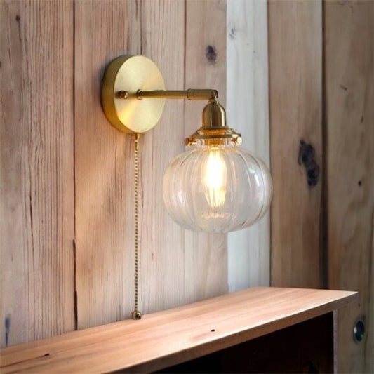 Vintage Brass Wall Sconce with Handblown Ribbed Glass Shade - Elegant Pull Chain Light Fixture for Bedroom or Living Room | Les Trois Pyramides