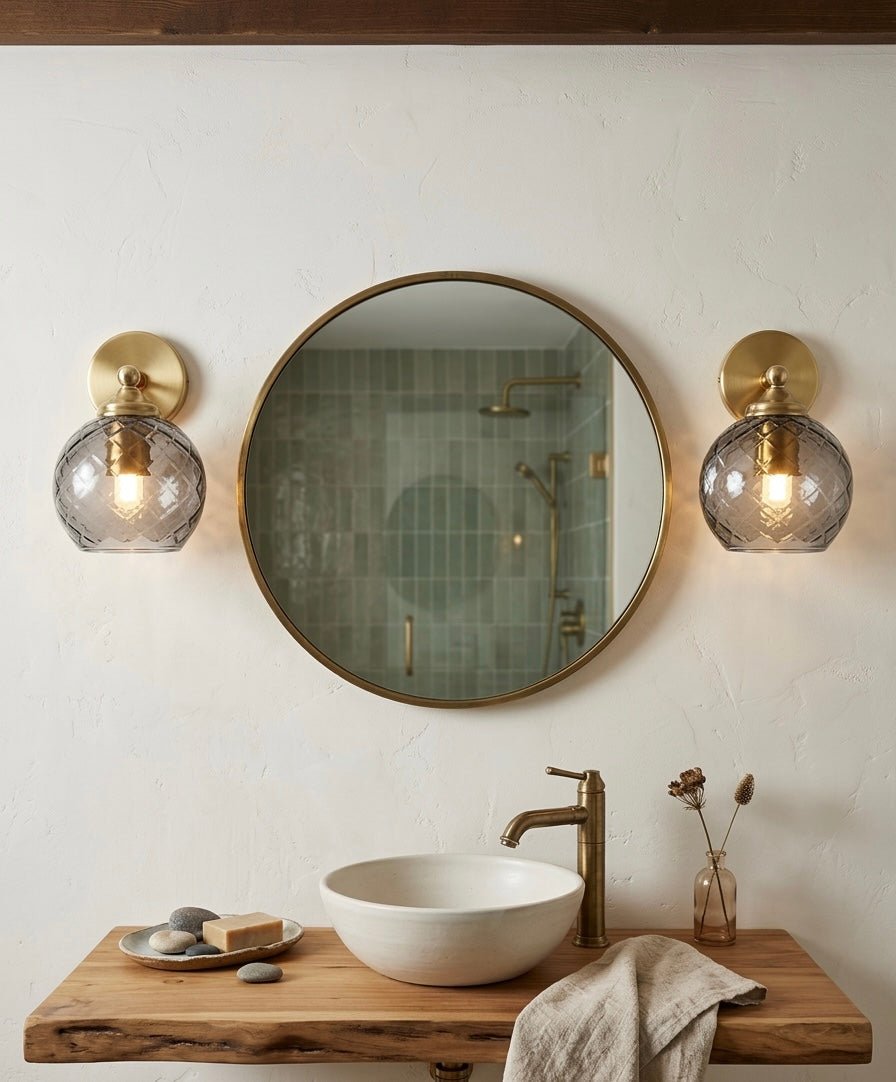 Wall-mounted smokey grey glass lamps with textured glass shade in bathroom - Les Trois Pyramides