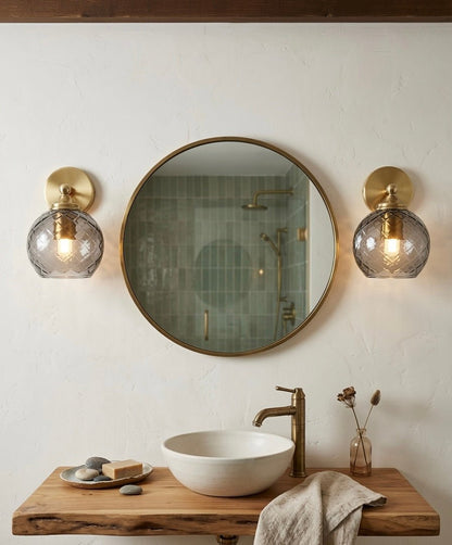 Wall-mounted smokey grey glass lamps with textured glass shade in bathroom - Les Trois Pyramides