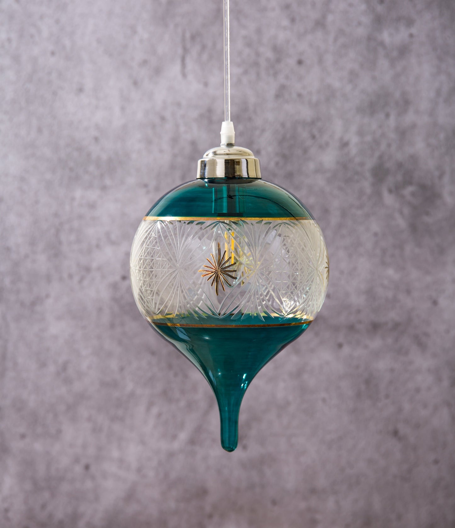 Engraved pendant light with 14 K Gold